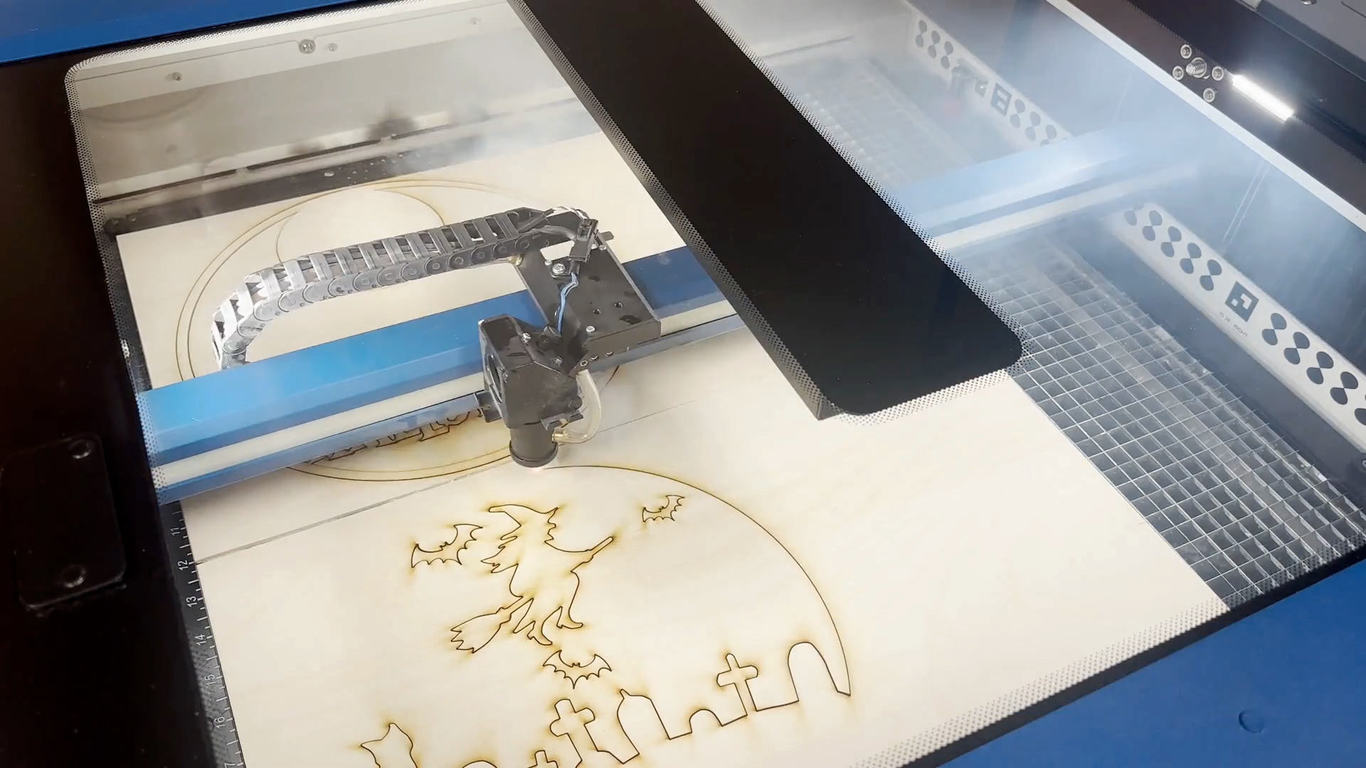 laser cutting plywood for multi-layered Halloween signage