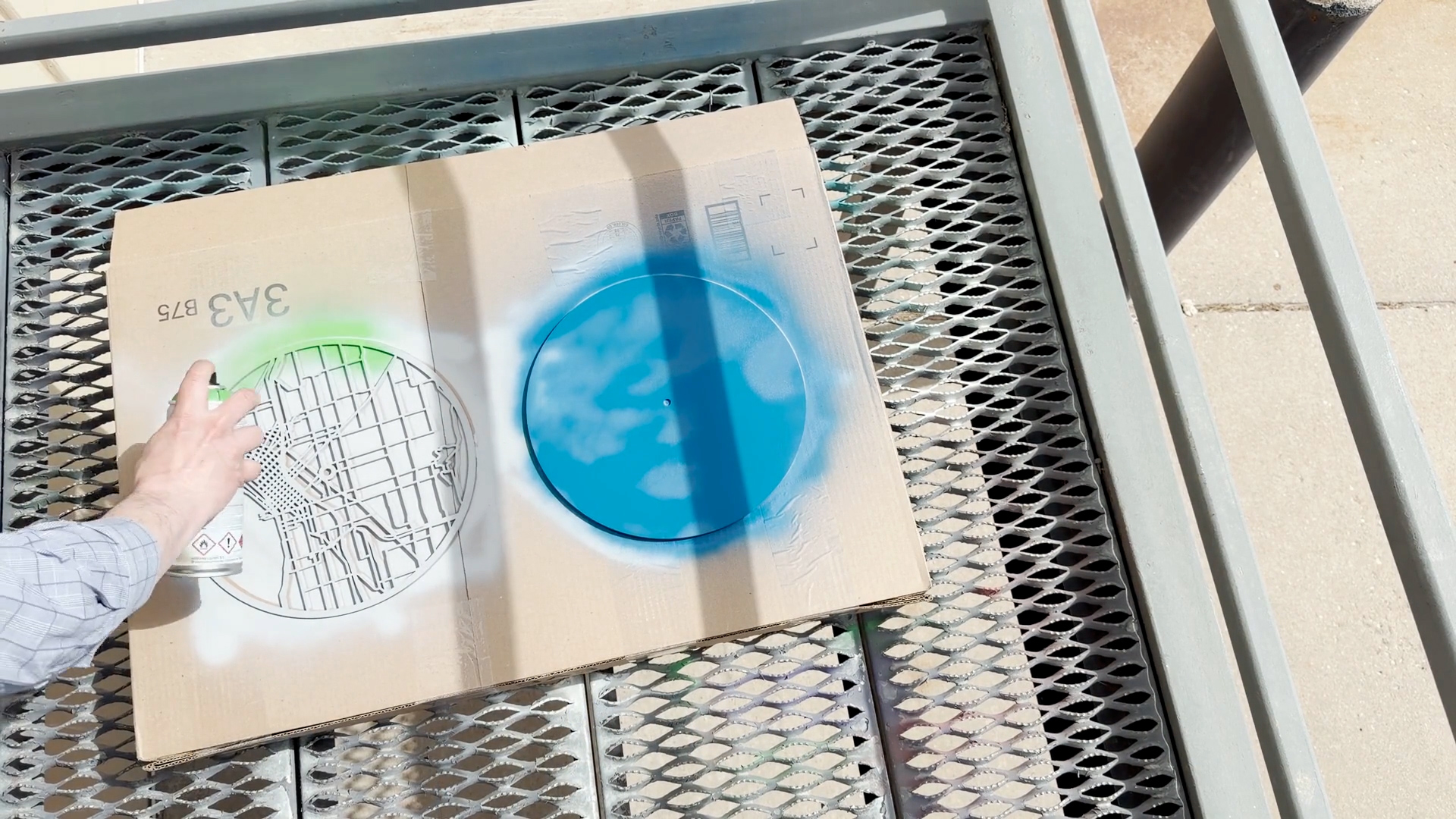 Spray painting laser cut city map clock