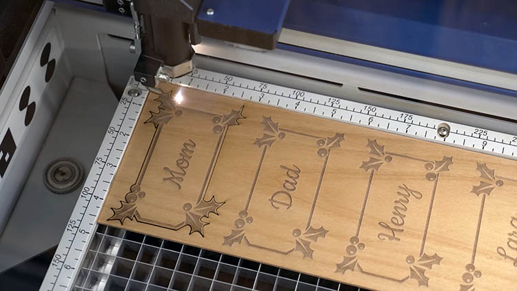 Laser cutting sheet of wood