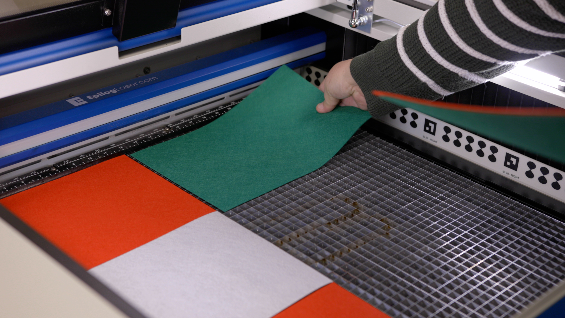 Placing felt sheet in laser machine