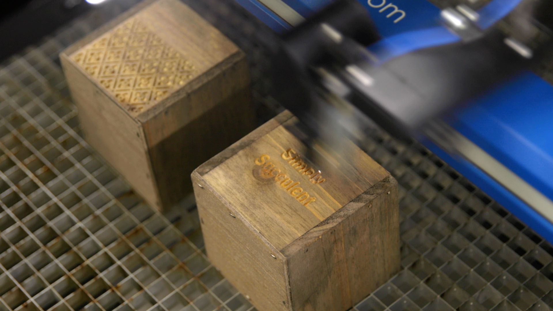 Rinsing off laser engraved planter boxes