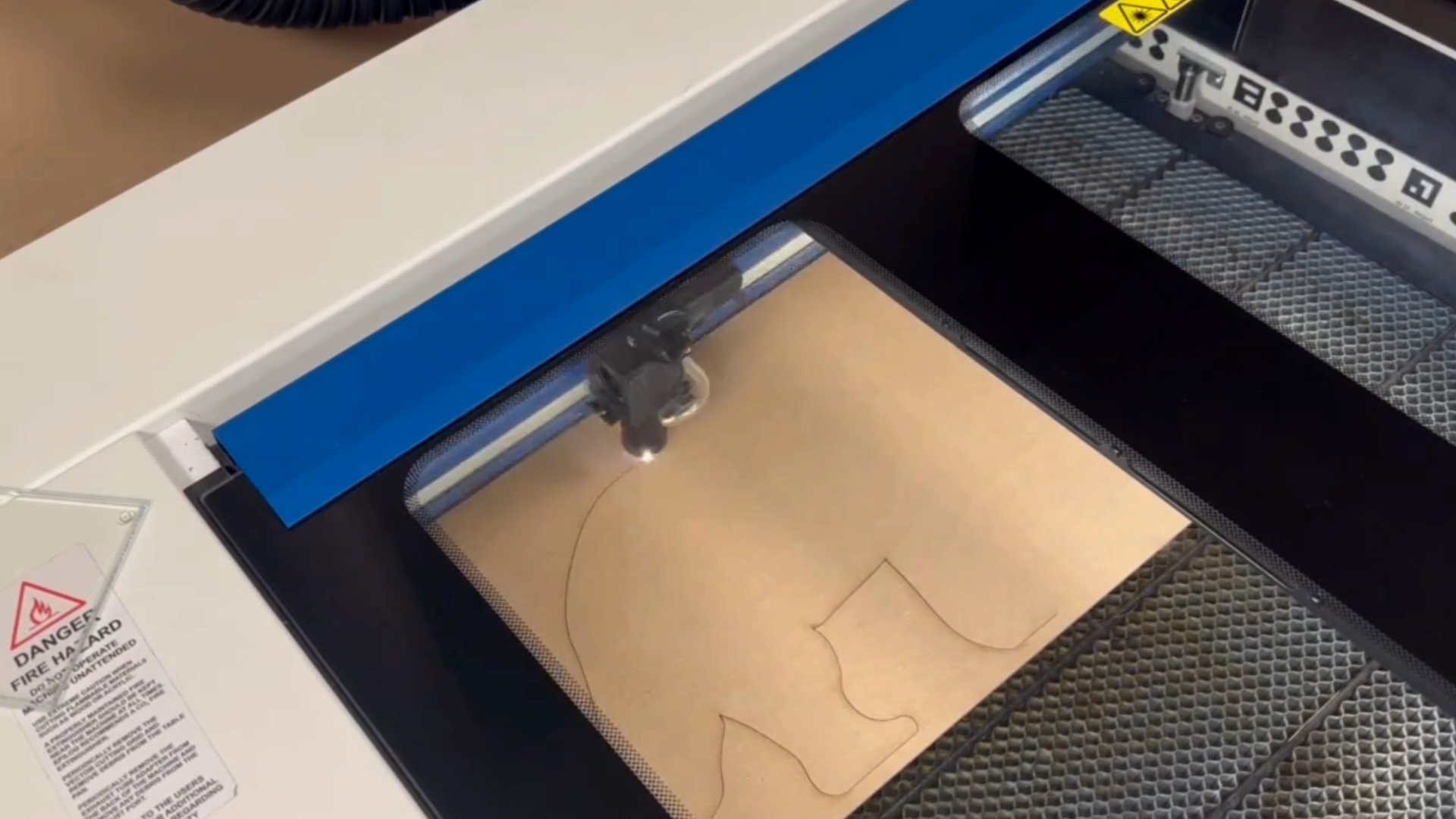 Laser cut multi-layer sign