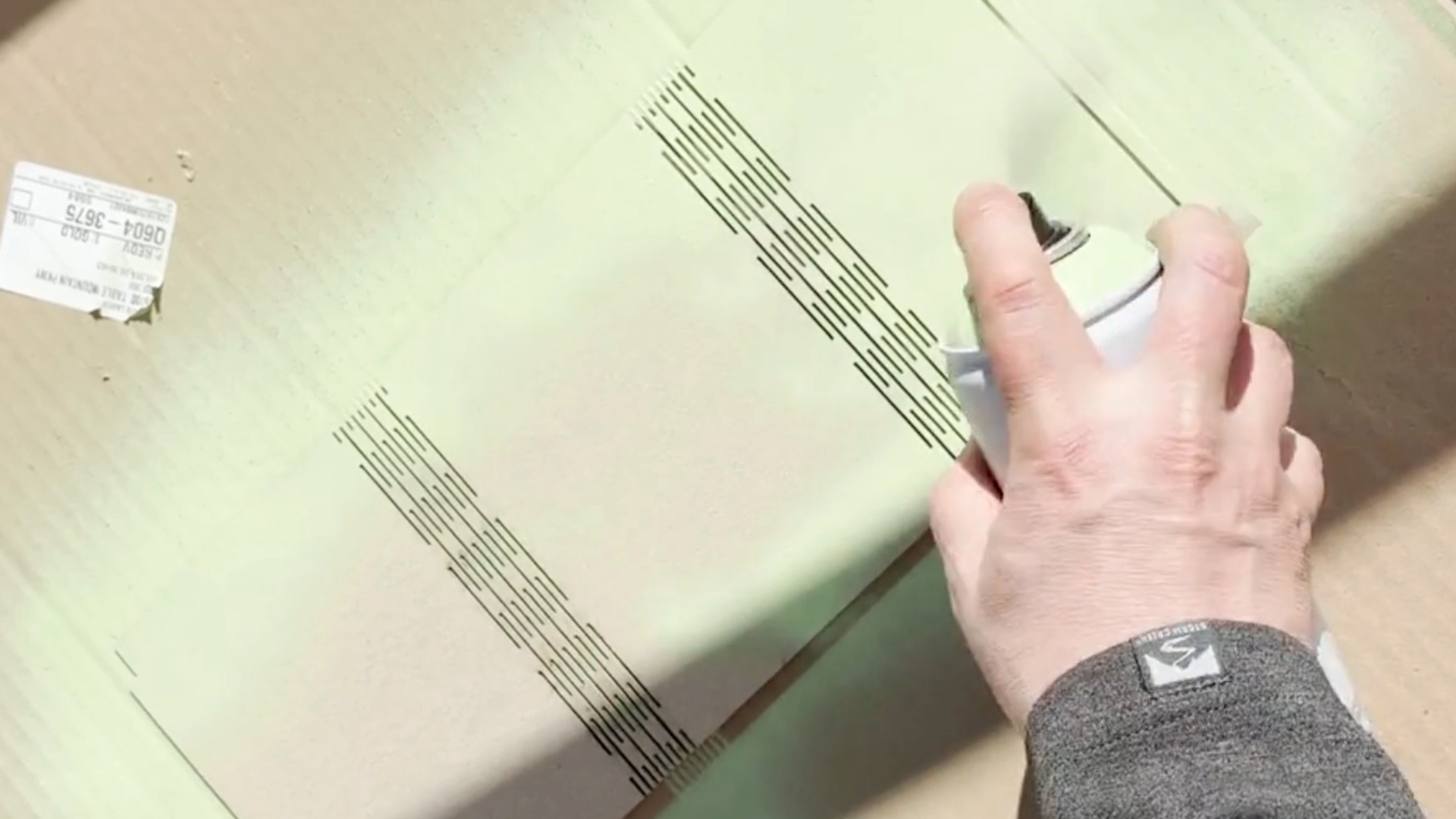 spray painting laser cut living hinge photo frame