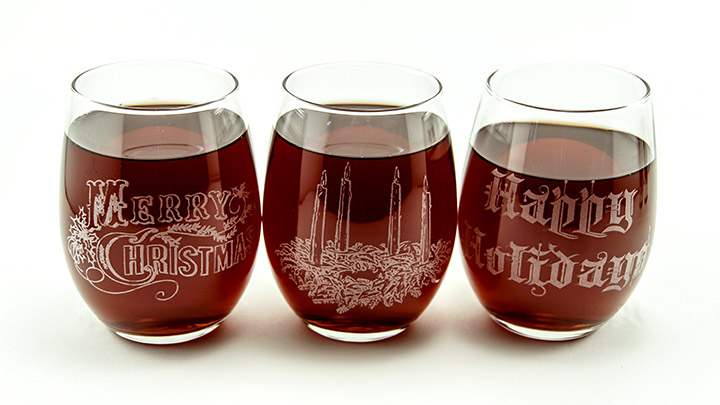 Laser etched stemless wine glasses.