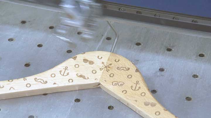 Wooden hanger while engraving