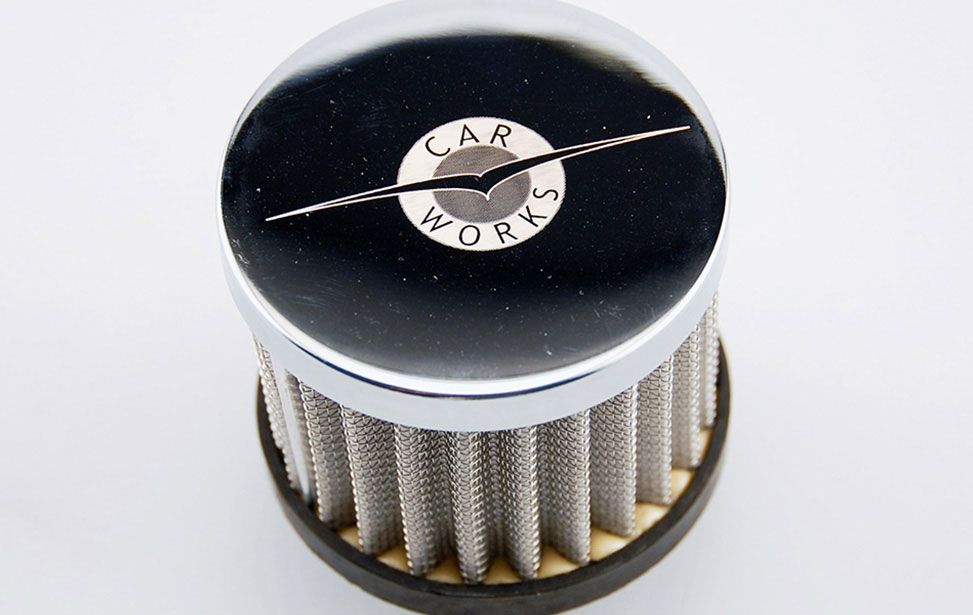 Chrome Air Filter Marked with an Epilog Fiber Laser