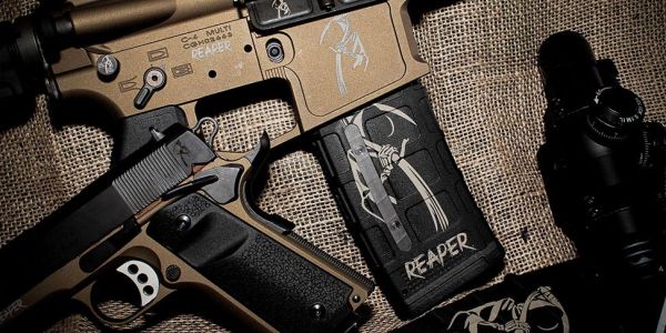 fiber laser engraved firearms featuring engravings on metal surfaces and hard plastic components