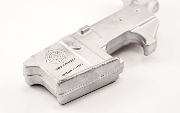 aluminum blank engraving close-up of a firearm part featuring deep, high-contrast fiber laser engraving