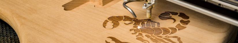 laser engraved scorpion on wood