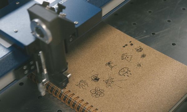 Laser engraved cork pad