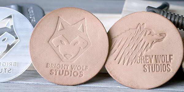 Leather patches debossed with laser engraved MDF and acrylic stamps