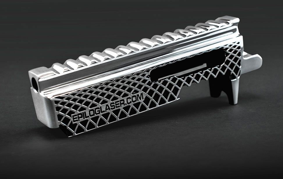 Polished metal part with ridges and grid pattern engraved with epiloglaser.com