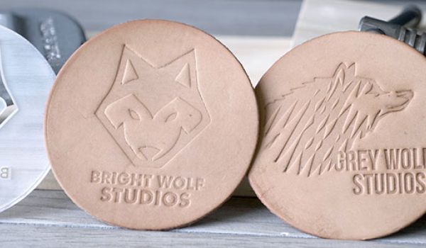 Leather patches debossed with laser engraved MDF and acrylic stamps